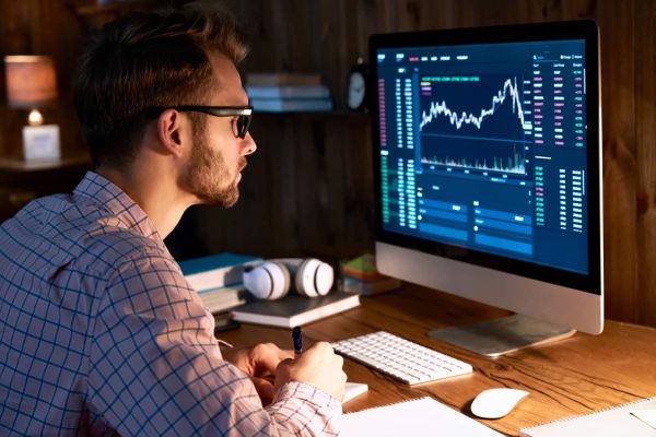 Man analyzing data on computer